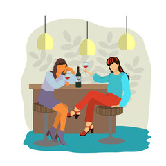 Two cute fashionable girls are sitting in a cafe