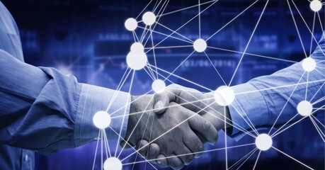 Network of connections over mid section of two businessmen shaking hands against data processing