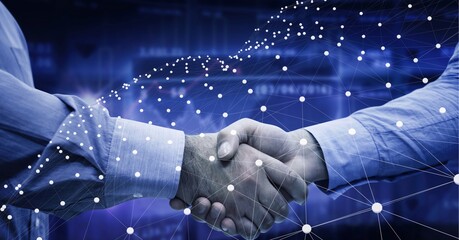 Network of connections over mid section of two businessmen shaking hands against data processing