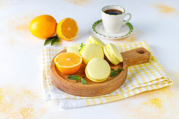 Obraz na płótnie Canvas Lemon macaroons with fresh fruits.