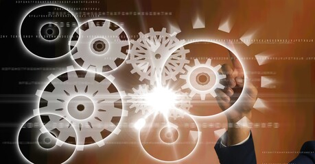 Composition of man touching screen with cogs and data processing