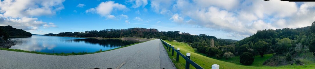 Across the road is a lake and Forrest 
