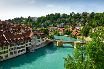 Fototapeta na wymiar Views of streets, river, houses and roofs of the old town Bern, Switzerland