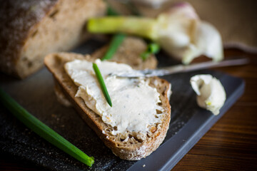 Homemade buckwheat bread with garlic cheese spread