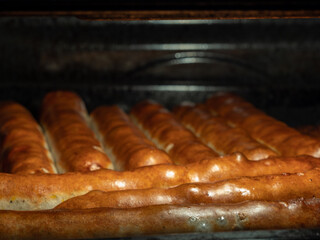 Fried sausage in the oven