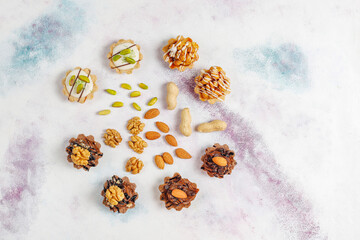 Various homemade mini tartlets with nuts and chocolate cream.