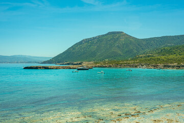 Fototapeta premium View to the Cyprus island sea coast with blue water and mountain. Akamas cape landscape