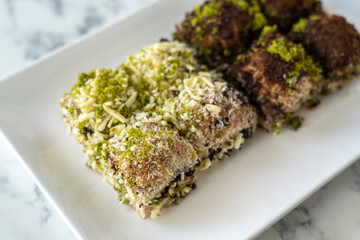 Traditional turkish new dessert cold milky baklava with pistachio