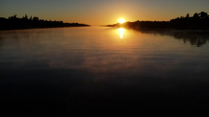 Obraz premium Evening with foggy river in South america at sunset