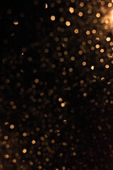 Bokeh from raindrops reflected with the lights.