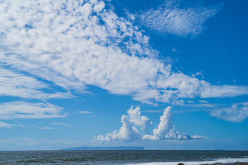 Ni'ihau island off the coast of Kauai, Hawaii and blue sky and clouds