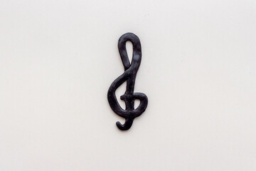 Obraz premium Abstract music notes made of rubber, top view. Music background