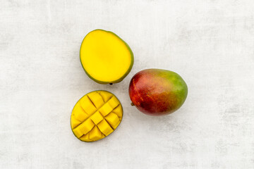 Mango fruit slices and cubes. Tropical fruits layout