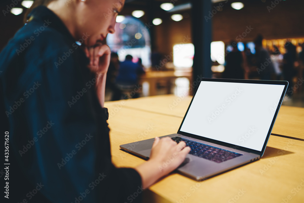 Aufkleber skilled female it professional using mock up laptop for browsing information and create program code