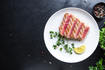 tuna grill seafood fried barbecue fish grilled  second course meal snack pescetarian diet vegetarian food copy space food background rustic. top view