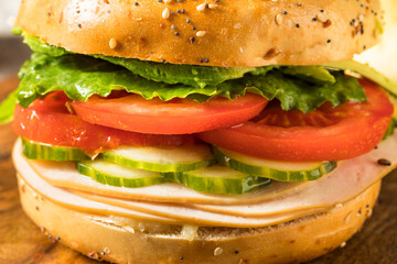 Homemade Bagel Turkey Sandwich with Lettuce