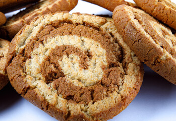 Beautiful delicious cookies scattered on the table.