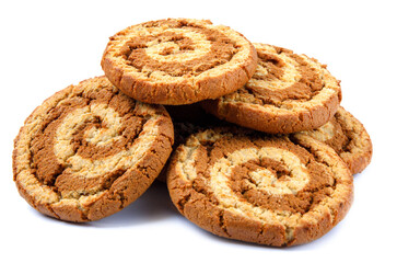 Several cookies are isolated on a white background. Cookies with a spiral pattern.