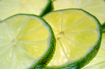Close-up shot of juicy lime wedges