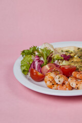 salad and omelet in a plate, tomatoes, cucumbers, greens and cabbage, diet food and drink for breakfast and lunch
