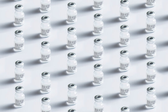 Close-up Of Some Vials With The Coronavirus Vaccine On A White Background