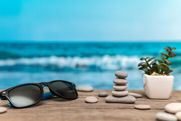 Pyramid of stones on the sea coast. Balance and harmony. Rest by the sea.