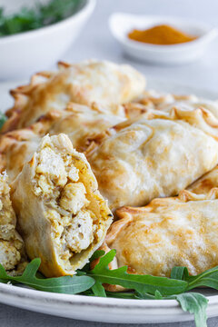 Top view of delicious plate of chicken curry turnovers