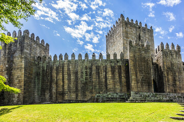 Obraz premium Castle of Guimaraes - medieval castle in the municipality Guimaraes, in the northern region of Portugal. It built under the orders of Mumadona Dias in X century.