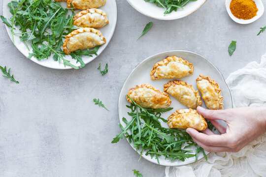 Top view of delicious plate of chicken curry turnovers