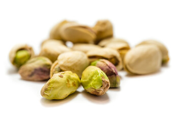 Pistachio nuts isolated on white background