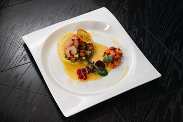 Shrimps with avocado, tomatos and mango sauce. Premium restaurant food