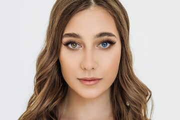 heterochromia in an attractive Caucasian young woman. face close-up, portrait of a beautiful woman...