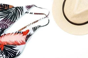 Tuinposter summer flat lay: bright women swimsuit and women hat © Anna