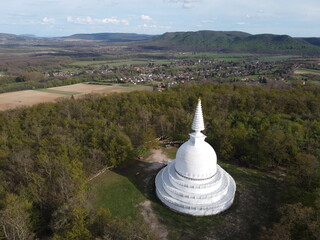 HUNGARY NEW STUPA. ZALASZÁNTÓI PEACE STUPA IN FOREST.
BUDDHIST ARCHITECTURE.