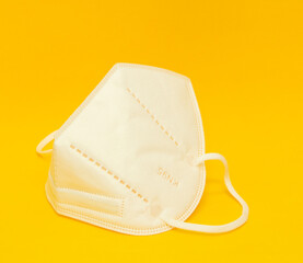 protection mask with a yellow background