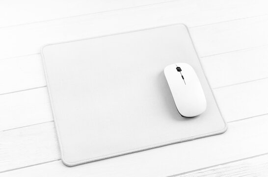 Computer Mouse On White Mouse Pad