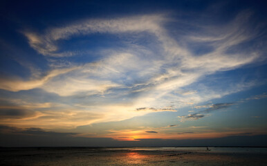 Beautiful blue twilight sky , clould sky during sun set over the sea, Colorful evening sky with sunrise and clould