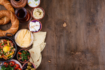 Traditional Turkish breakfast with meze and simit