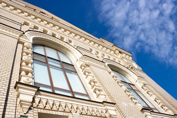 Background for the design, texture of walls and windows of old houses. On the streets in public places