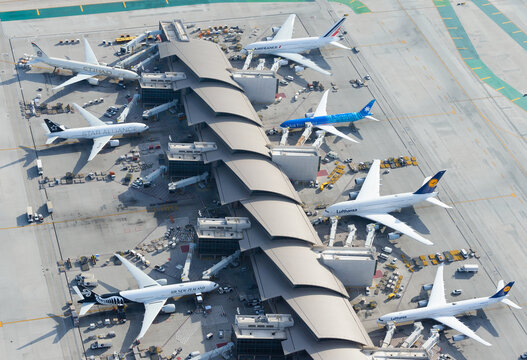Aerial view of Tom Bradley International Terminal at Los Angeles Airport LAX, USA. Air travel demand in airport concourse seen from above.