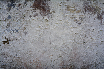 artistic grunge background from old abandoned wall with peeling concrete plaster for creative design