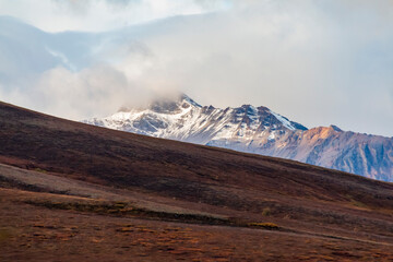 dramatic landscape of  mountain peaks and mountain ranges inside Denali National Park  during...