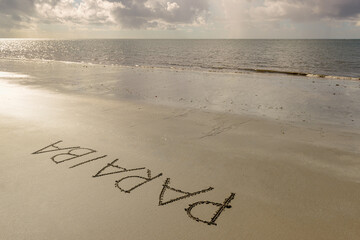 Name of the state of Paraiba written in the sand of the beach, early in the morning in Joao Pessoa, Paraiba, Brazil on May 8, 2021.