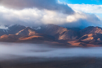 dramatic landscape of  mountain peaks and mountain ranges inside Denali National Park  during...