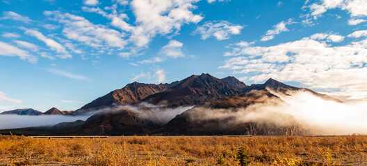 dramatic landscape of  mountain peaks and mountain ranges inside Denali National Park  during...