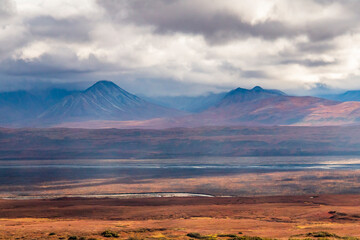 dramatic landscape of  mountain peaks and mountain ranges inside Denali National Park  during...