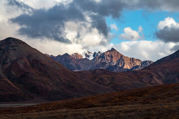 dramatic landscape of  mountain peaks and mountain ranges inside Denali National Park  during...