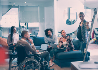 Pregnant Businesswoman Leads Creative Meeting Of Business Team In Modern Coworking open Space Office