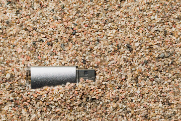 The flash drive was lost in the sand