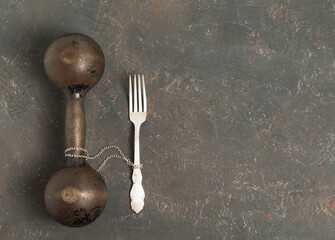 Plate with fork on a decorative background